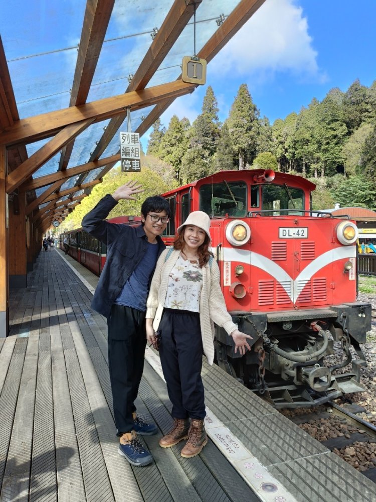 us with the train we took at Chaoping train station, Alishan national park